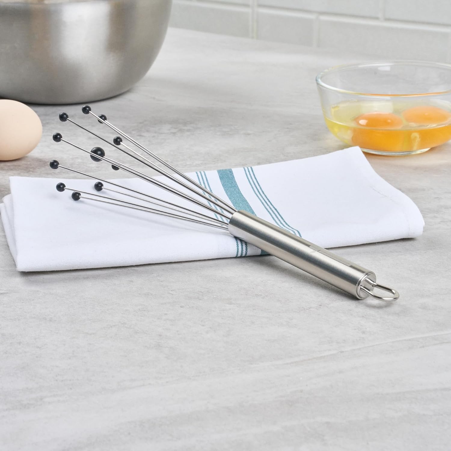 10.5 in Stainless Steel Ball Whisk - German Standard Egg Beater with Ergonomic Handle, Dishwasher Safe - Manual Mixer Cooking Whisk for Baking, Stirring, Sauces, Beating